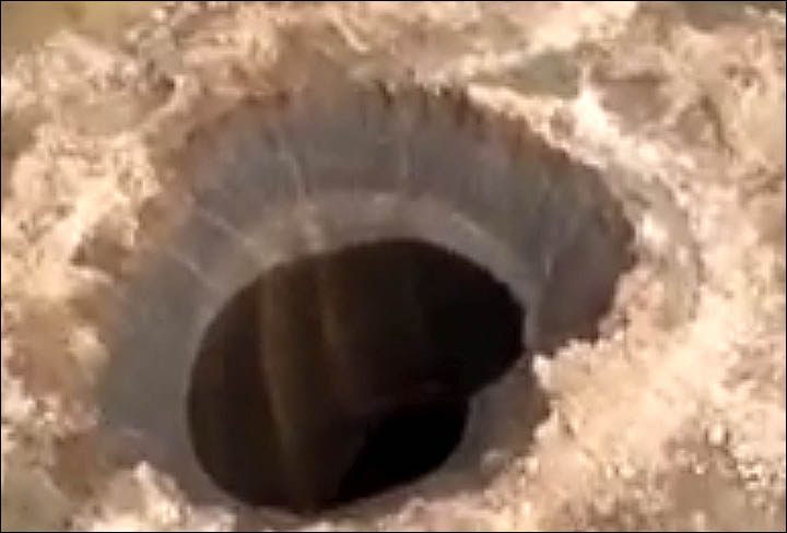 Siberia large crater sink hole super inside at the distance closeup